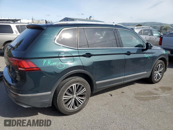 2018 Volkswagen Tiguan SEL with VIN 3VV3B7AX8JM051483, listed as a Copart auction lot 50076645 with 156,356 mi miles and Salvage Title. Bid and sale history available at DreamBid. Image 3.