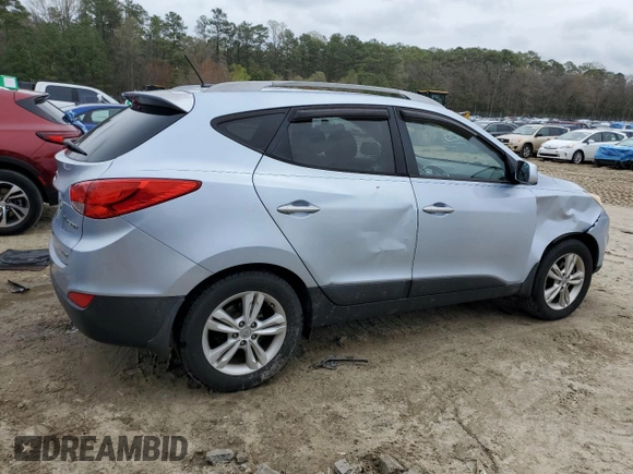 2011 Hyundai Tucson Limited with VIN KM8JUCAC8BU196358, listed as a Copart auction lot 51111975 with 200,439 mi miles and Salvage Title. Bid and sale history available at DreamBid. Image 3.