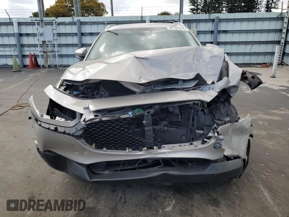 2024 Mazda CX-30 S Premium with VIN 3MVDMBDM6RM653469, listed as a Copart auction lot 47192475 with 9,854 mi miles and Salvage title. Bid and sale history available at DreamBid. Image 5.