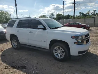 2019 Chevrolet Tahoe LT z VIN 1GNSCBKCXKR379274, wystawiony jako Copart lot #57878805 z przebiegiem 77 936 mil mil oraz Czysty tytuł • Clean title. Historia ofert i sprzedaży dostępna na DreamBid. Obrazek 4.