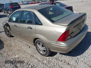 2000 Ford Focus SE with VIN 1FAFP3434YW401903, listed as a IAAI auction lot 42104706 with 201,826 mi miles and . Bid and sale history available at DreamBid. Image 3.