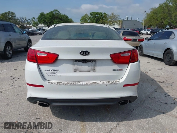 2015 Kia Optima EX with VIN 5XXGN4A72FG414486, listed as a IAAI auction lot 41870529 with 119,029 mi miles. Bid and sale history available at carsss.com. Image 16.