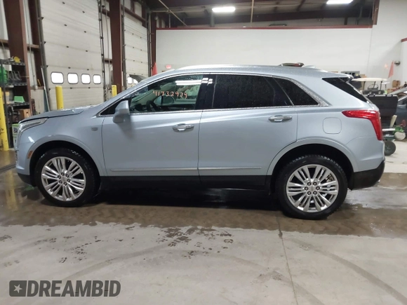 2017 Cadillac XT5 Premium Luxury AWD z VIN 1GYKNERS4HZ306955, wystawiony jako IAAI lot #41932934 z przebiegiem 150 050 mil mil oraz . Historia ofert i sprzedaży dostępna na DreamBid. Obrazek 14.