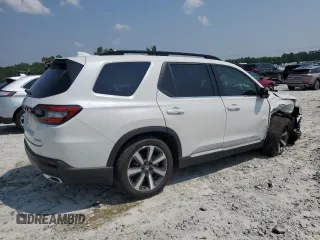 2023 Honda Pilot Touring with VIN 5FNYG2H77PB014212, listed as a Copart auction lot 59222715 with 4,507 mi miles and Salvage title. Bid and sale history available at DreamBid. Image 3.