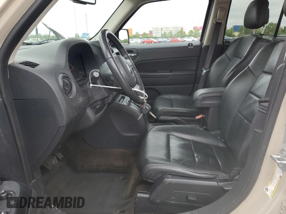 2017 Jeep Patriot High Altitude with VIN 1C4NJRFB3HD162483, listed as a Copart auction lot 58160515 with 135,038 mi miles and Salvage title. Bid and sale history available at DreamBid. Image 7.