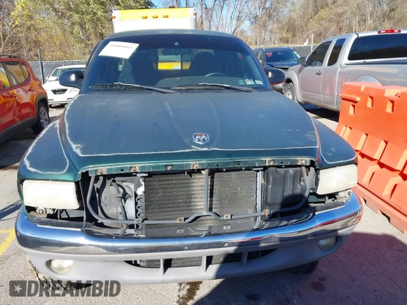 1998 Dodge Dakota SLT with VIN 1B7GG22X3WS573262, listed as a IAAI auction lot 40905093 with 148,684 mi miles and . Bid and sale history available at DreamBid. Image 6.