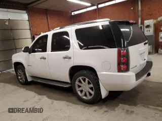 2013 GMC Yukon Denali with VIN 1GKS2EEF1DR319491, listed as a Copart auction lot 51065985 with 179,553 mi miles and Salvage Title. Bid and sale history available at carsss.com. Image 2.