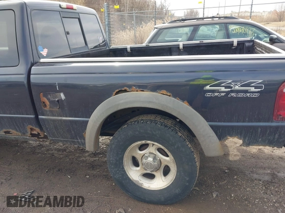 2001 Ford Ranger XL Fleet z VIN 1FTZR15E11PB68777, wystawiony jako IAAI lot #41673554 z przebiegiem 185 621 mil mil oraz . Historia ofert i sprzedaży dostępna na DreamBid. Obrazek 6.
