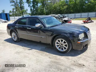 2008 Chrysler 300 C Hemi with VIN 2C3KA63H08H156142, listed as a Copart auction lot 53741595 with 216,677 mi miles and Salvage Title. Bid and sale history available at carsss.com. Image 4.