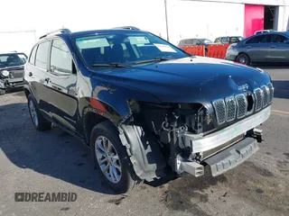 2019 Jeep Cherokee Latitude z VIN 1C4PJMCB9KD351369, wystawiony jako IAAI lot #41408094 z przebiegiem 52 639 mil mil oraz . Historia ofert i sprzedaży dostępna na DreamBid. Obrazek 1.