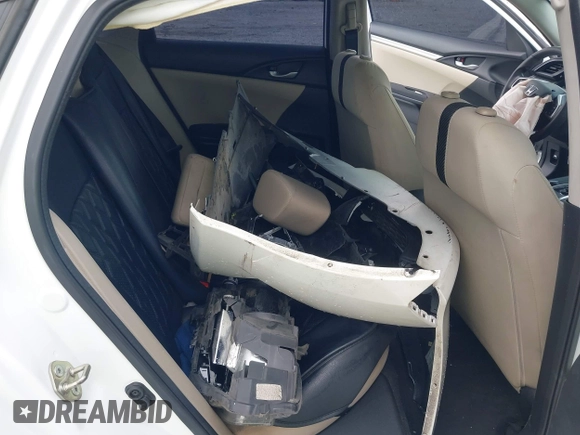 2018 Honda Civic LX with VIN 2HGFC2F59JH576975, listed as a IAAI auction lot 42098020 with 89,791 mi miles and . Bid and sale history available at DreamBid. Image 12.