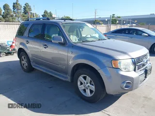 2008 Ford Escape Hybrid z VIN 1FMCU49H78KE79028, wystawiony jako IAAI lot #42283170 z przebiegiem 131 642 mil mil oraz . Historia ofert i sprzedaży dostępna na DreamBid. Obrazek 1.