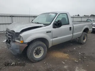 2002 Ford F-350 XL with VIN 1FTSF31F12EB21069, listed as a Copart auction lot 84287374 with 110,890 mi miles and Salvage Title. Bid and sale history available at DreamBid. Image 1.