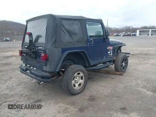 2004 Jeep Wrangler X with VIN 1J4FA39S64P780915, listed as a IAAI auction lot 42035524 with 131,057 mi miles. Bid and sale history available at carsss.com. Image 4.