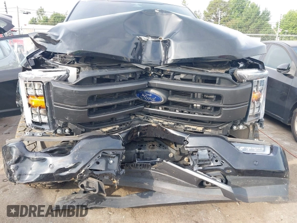 2023 Ford F-150 XL with VIN 1FTFW1E5XPFA81258, listed as a IAAI auction lot 42480441 with 34,950 mi miles and . Bid and sale history available at DreamBid. Image 6.