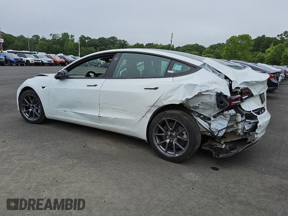 2023 Tesla Model 3 with VIN 5YJ3E1EA0PF463239, listed as a Copart auction lot 59770525 with 48,086 mi miles and Clean title. Bid and sale history available at DreamBid. Image 2.