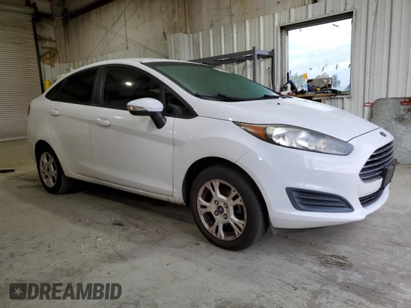 2016 Ford Fiesta SE with VIN 3FADP4BJ8GM150994, listed as a Copart auction lot 83594754 with 96,509 mi miles and Salvage Title. Bid and sale history available at DreamBid. Image 4.