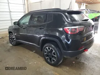 2020 Jeep Compass Trailhawk with VIN 3C4NJDDB0LT159324, listed as a Copart auction lot 50961595 with 86,446 mi miles and Salvage Title. Bid and sale history available at carsss.com. Image 2.