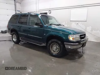 1997 Ford Explorer XLT z VIN 1FMDU35P3VUC49711, wystawiony jako IAAI lot #41414941 z przebiegiem 249 309 mil mil oraz . Historia ofert i sprzedaży dostępna na DreamBid. Obrazek 1.