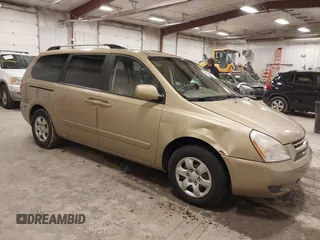 2009 Kia Sedona LX with VIN KNDMB233996314804, listed as a IAAI auction lot 42014187 with 220,693 mi miles and . Bid and sale history available at DreamBid. Image 1.