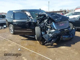 2017 GMC Yukon Denali with VIN 1GKS2CKJ0HR185365, listed as a IAAI auction lot 41856187 with 107,641 mi miles. Bid and sale history available at carsss.com. Image 1.