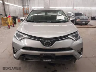 2018 Toyota RAV4 XLE with VIN 2T3RFREV4JW809416, listed as a IAAI auction lot 41263522 with 54,615 mi miles. Bid and sale history available at carsss.com. Image 13.