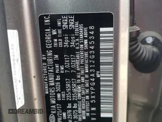 2018 Kia Sorento LX z VIN 5XYPG4A31JG345348, wystawiony jako Copart lot #55413455 z przebiegiem 64 868 mil mil oraz Szkoda całkowita • Salvage title. Historia ofert i sprzedaży dostępna na DreamBid. Obrazek 13.