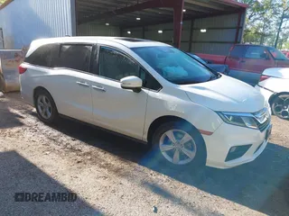 2019 Honda Odyssey EX-L with VIN 5FNRL6H74KB015835, listed as a IAAI auction lot 42044603 with 109,740 mi miles. Bid and sale history available at carsss.com. Image 1.