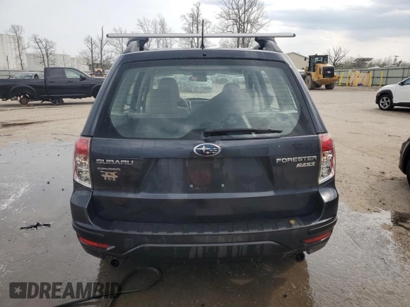 2012 Subaru Forester X with VIN JF2SHABC8CH409191, listed as a Copart auction lot 54823995 with Not Provided miles and Salvage Title. Bid and sale history available at DreamBid. Image 6.