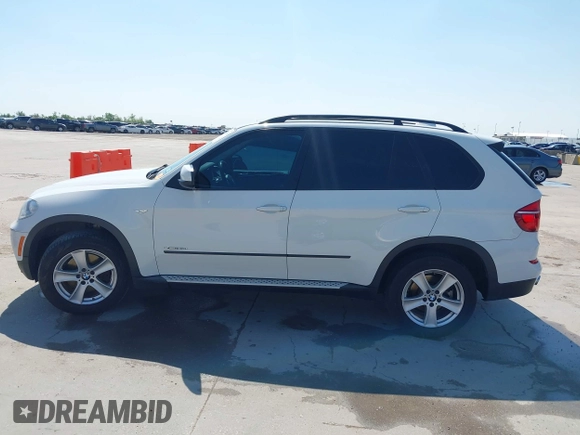 2012 BMW X5 35d z VIN 5UXZW0C57CL672538, wystawiony jako IAAI lot #41967268 z przebiegiem 141 996 mil mil oraz . Historia ofert i sprzedaży dostępna na DreamBid. Obrazek 14.
