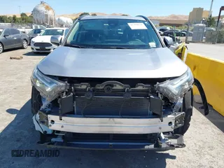 2022 Toyota RAV4 Hybrid XLE with VIN 4T3RWRFV2NU066761, listed as a IAAI auction lot 42784621 with 24,711 mi miles and . Bid and sale history available at DreamBid. Image 13.