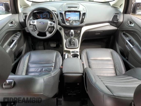 2016 Ford C-Max Energi SEL with VIN 1FADP5CU4GL112498, listed as a Copart auction lot 58612914 with 106,069 mi miles and Salvage Title. Bid and sale history available at carsss.com. Image 8.