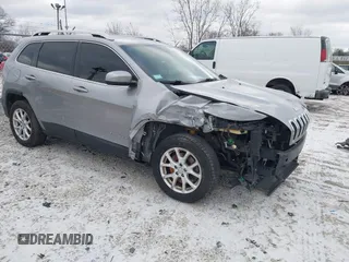 2016 Jeep Cherokee 75th Anniversary with VIN 1C4PJLCB1GW297555, listed as a IAAI auction lot 41232269 with 257,033 mi miles. Bid and sale history available at carsss.com. Image 1.