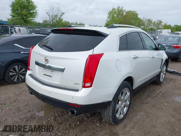 2014 Cadillac SRX Performance Collection with VIN 3GYFNCE34ES519059, listed as a IAAI auction lot 42237351 with 80,578 mi miles and . Bid and sale history available at DreamBid. Image 4.