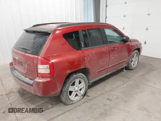 2010 Jeep Compass Sport with VIN 1J4NF4FB2AD506051, listed as a IAAI auction lot 41552084 with 218,785 mi miles. Bid and sale history available at carsss.com. Image 4.