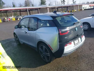 2014 BMW i3 with VIN WBY1Z4C54EV275808, listed as a IAAI auction lot 41659125 with NaN miles. Bid and sale history available at carsss.com. Image 3.