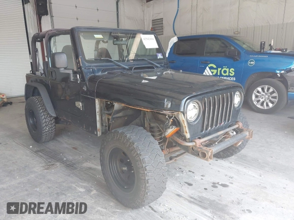 1999 Jeep Wrangler Sport with VIN 1J4FY19S4XP494405, listed as a IAAI auction lot 42542416 with 168,856 mi miles and . Bid and sale history available at DreamBid. Image 1.