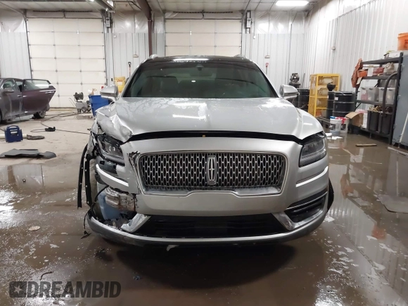 2019 Lincoln Nautilus Reserve with VIN 2LMPJ6L96KBL18957, listed as a IAAI auction lot 41563412 with 62,539 mi miles and . Bid and sale history available at DreamBid. Image 12.