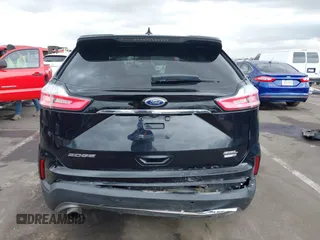 2020 Ford Edge SEL z VIN 2FMPK4J9XLBA78278, wystawiony jako IAAI lot #42181490 z przebiegiem 236 730 mil mil oraz . Historia ofert i sprzedaży dostępna na DreamBid. Obrazek 16.