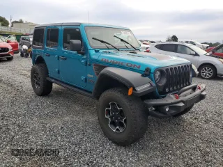 2020 Jeep Wrangler Unlimited Recon with VIN 1C4HJXFN5LW330617, listed as a Copart auction lot 73430514 with 52,827 mi miles and Salvage title. Bid and sale history available at DreamBid. Image 4.