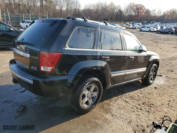 2006 Jeep Grand Cherokee Overland with VIN 1J8HR68256C334929, listed as a Copart auction lot 79450964 with 184,944 mi miles and Salvage Title. Bid and sale history available at carsss.com. Image 3.