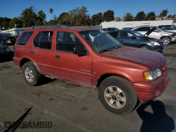 2001 Isuzu Rodeo S with VIN 4S2CK58W014302125, listed as a Copart auction lot 76425614 with 204,350 mi miles and Salvage title. Bid and sale history available at DreamBid. Image 4.