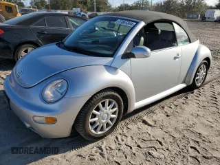 2004 Volkswagen Beetle with VIN 3VWCM21Y34M300701, listed as a Copart auction lot 77567344 with 91,236 mi miles and Salvage Title. Bid and sale history available at DreamBid. Image 1.