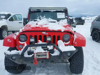 2015 Jeep Wrangler Unlimited Rubicon with VIN 1C4BJWFG7FL646463, listed as a IAAI auction lot 41537553 with 97,412 mi miles. Bid and sale history available at carsss.com. Image 12.
