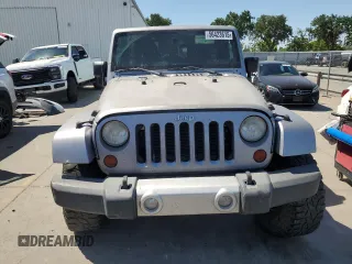 2013 Jeep Wrangler Unlimited Sahara with VIN 1C4BJWEG5DL662756, listed as a Copart auction lot 56423615 with 189,355 mi miles and Salvage title. Bid and sale history available at DreamBid. Image 5.