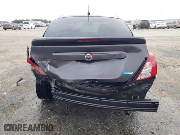 2015 Nissan Versa SV with VIN 3N1CN7AP0FL879386, listed as a Copart auction lot 57964685 with 119,321 mi miles and Salvage title. Bid and sale history available at DreamBid. Image 6.