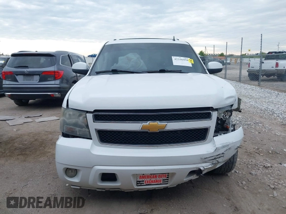 2013 Chevrolet Suburban LT with VIN 1GNSCJE05DR147101, listed as a IAAI auction lot 42336950 with 147,429 mi miles and . Bid and sale history available at DreamBid. Image 13.