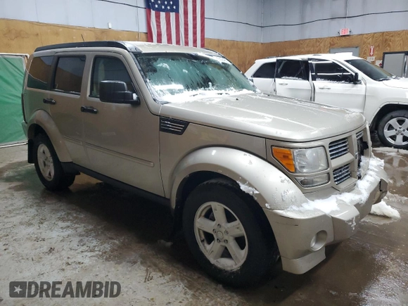 2010 Dodge Nitro SXT z VIN 1D4PU5GK8AW124381, wystawiony jako Copart lot #89302485 z przebiegiem 115 947 mil mil oraz Czysty tytuł • Clean title. Historia ofert i sprzedaży dostępna na DreamBid. Obrazek 4.