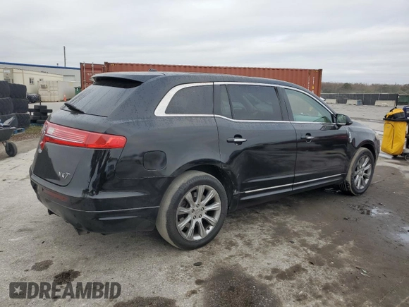 2014 Lincoln MKT with VIN 2LMHJ5FK0EBL53429, listed as a Copart auction lot 88496855 with 370,610 mi miles and Salvage Title. Bid and sale history available at DreamBid. Image 3.