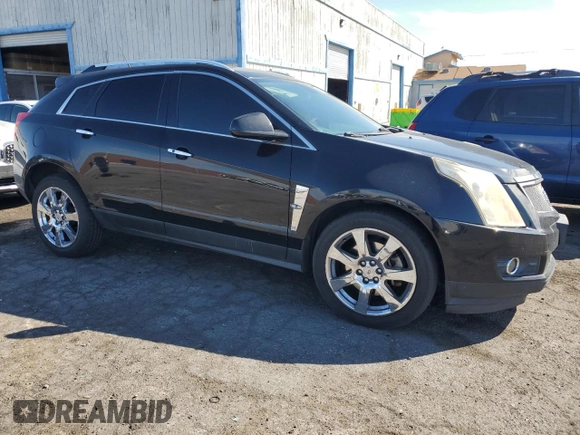 2012 Cadillac SRX Premium Collection with VIN 3GYFNCE39CS511617, listed as a Copart auction lot 48957725 with 162,361 mi miles and Clean title. Bid and sale history available at DreamBid. Image 4.